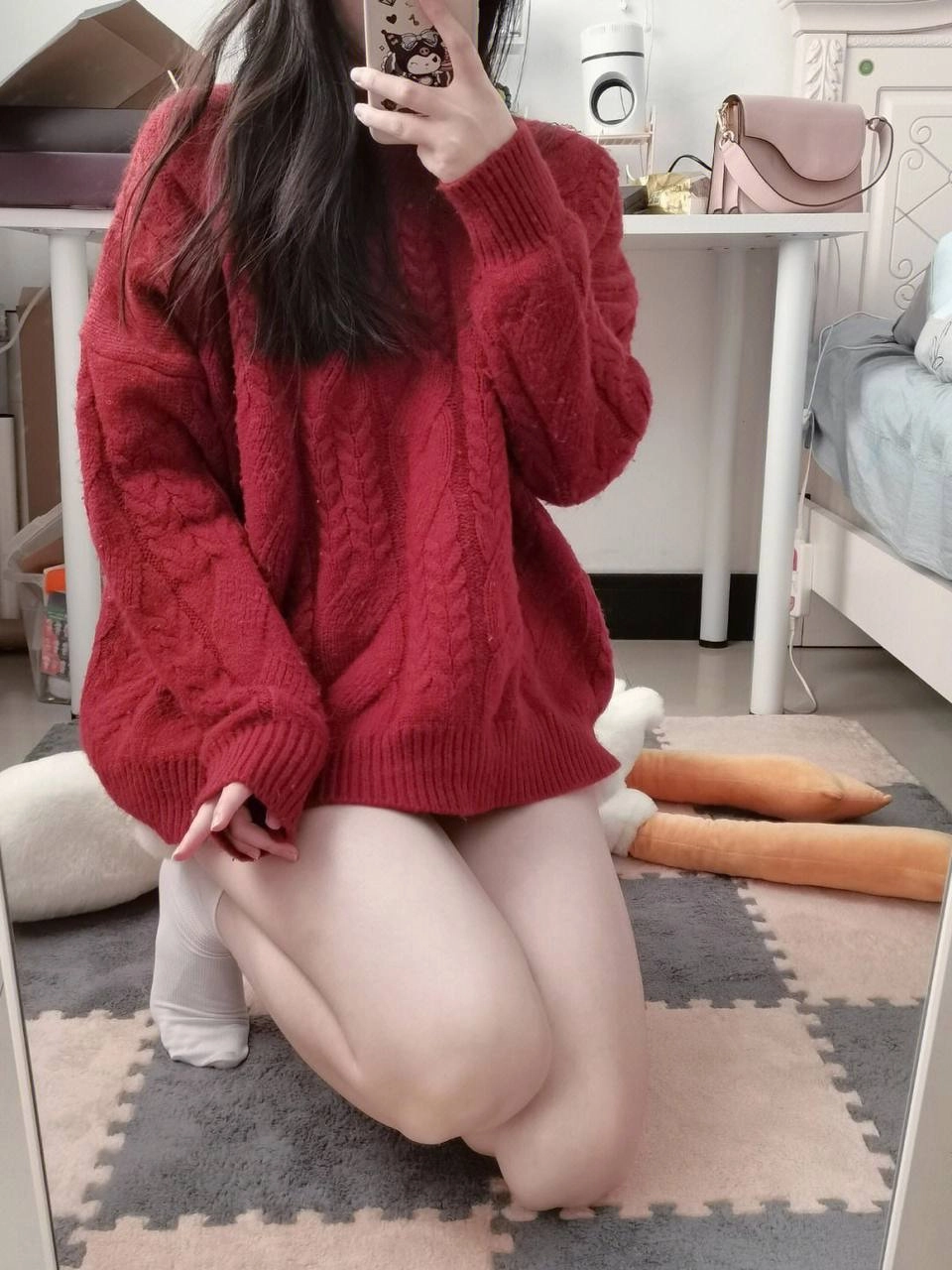 red sweater leg