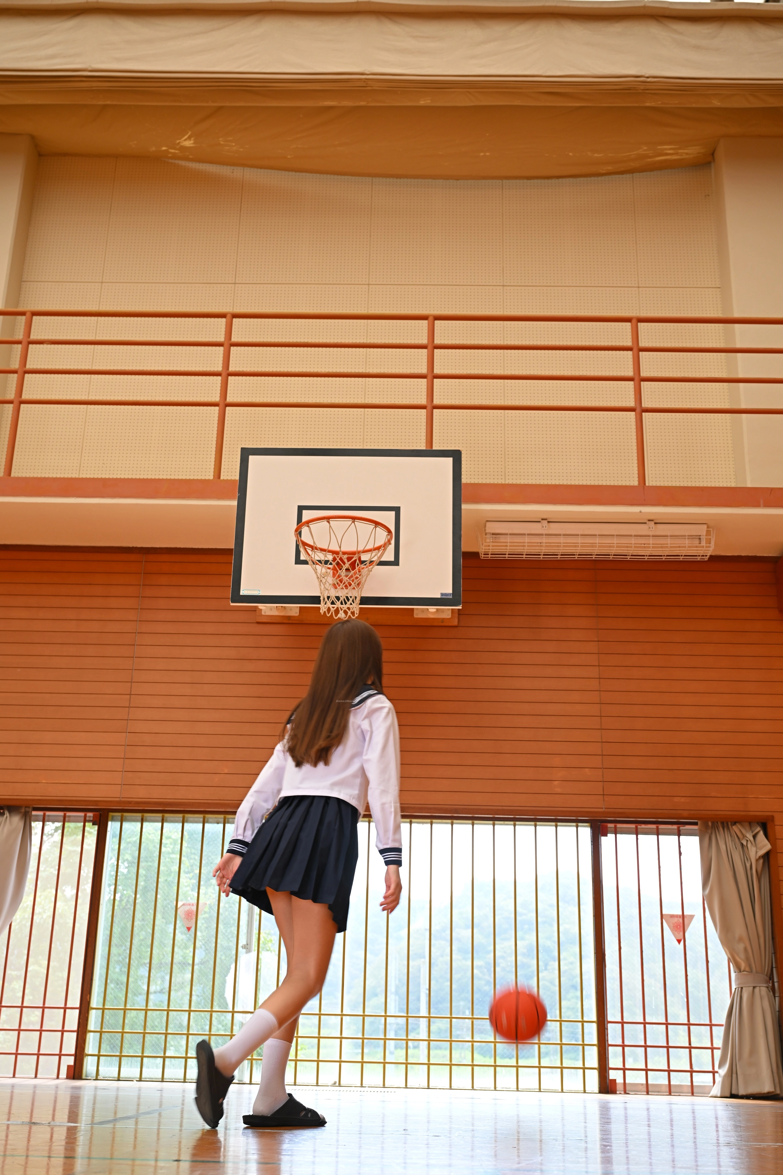 Shooting baskets.