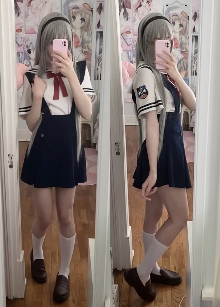 女人用蓝色和白色的裙子拍自拍。