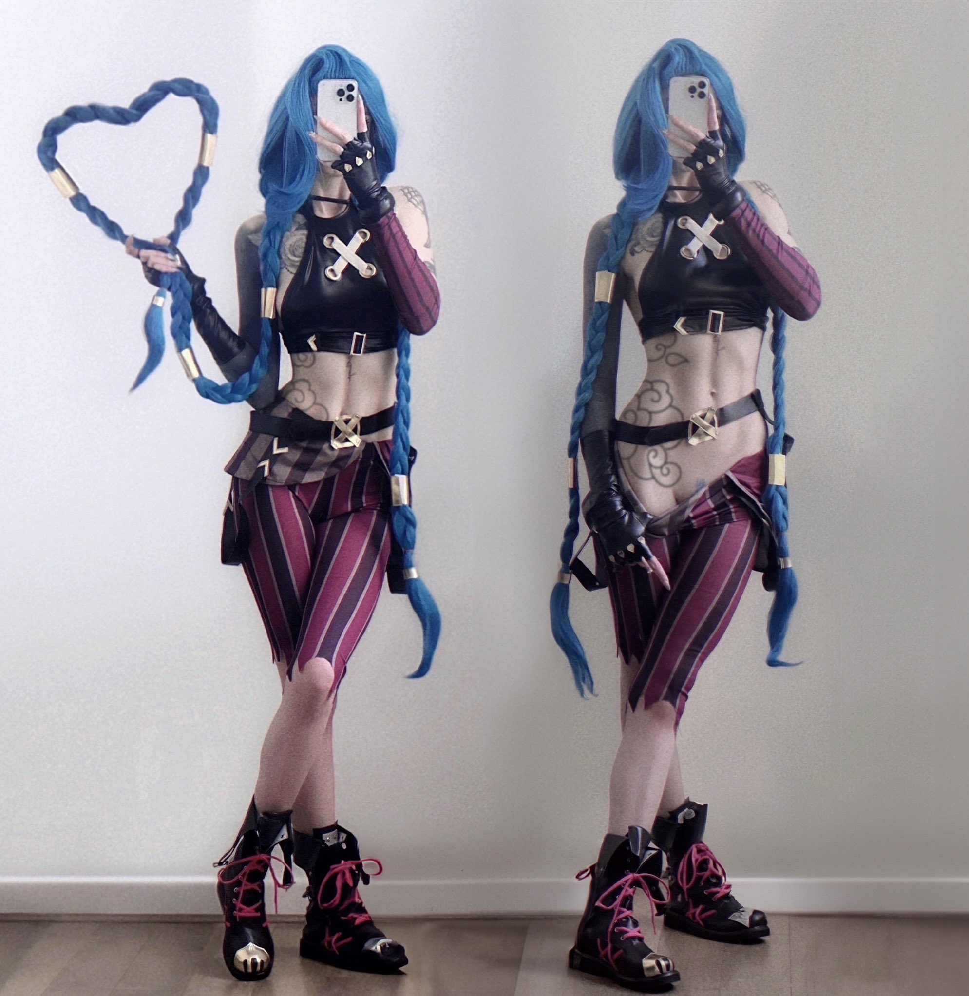 穿着黑色和蓝色服装的女人拥有一只心脏形状的手。