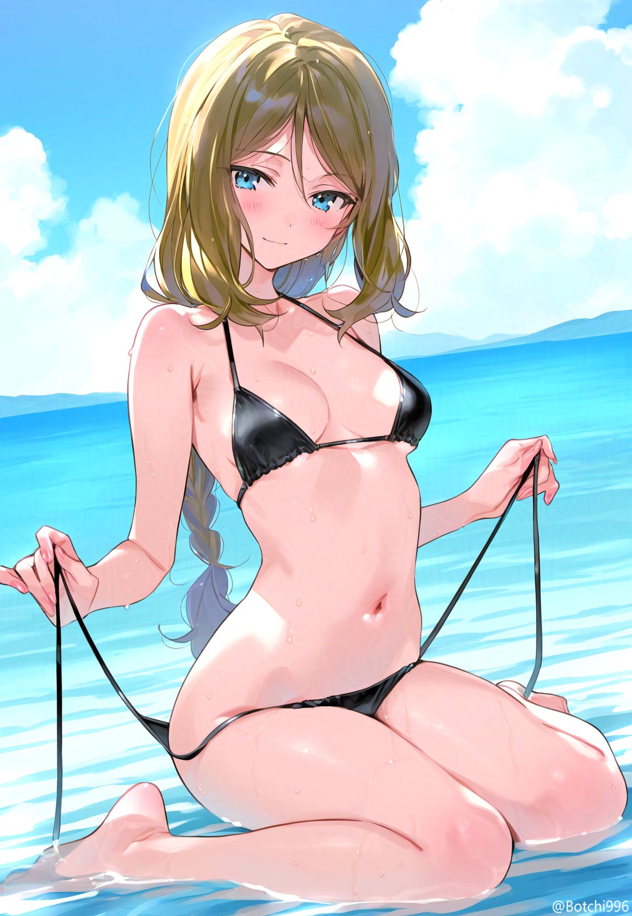 穿比基尼的女人坐在海滩上。