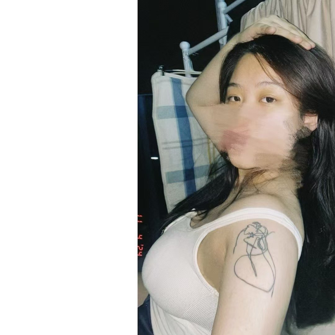 黑头发的女人和一件绿色的衬衫。