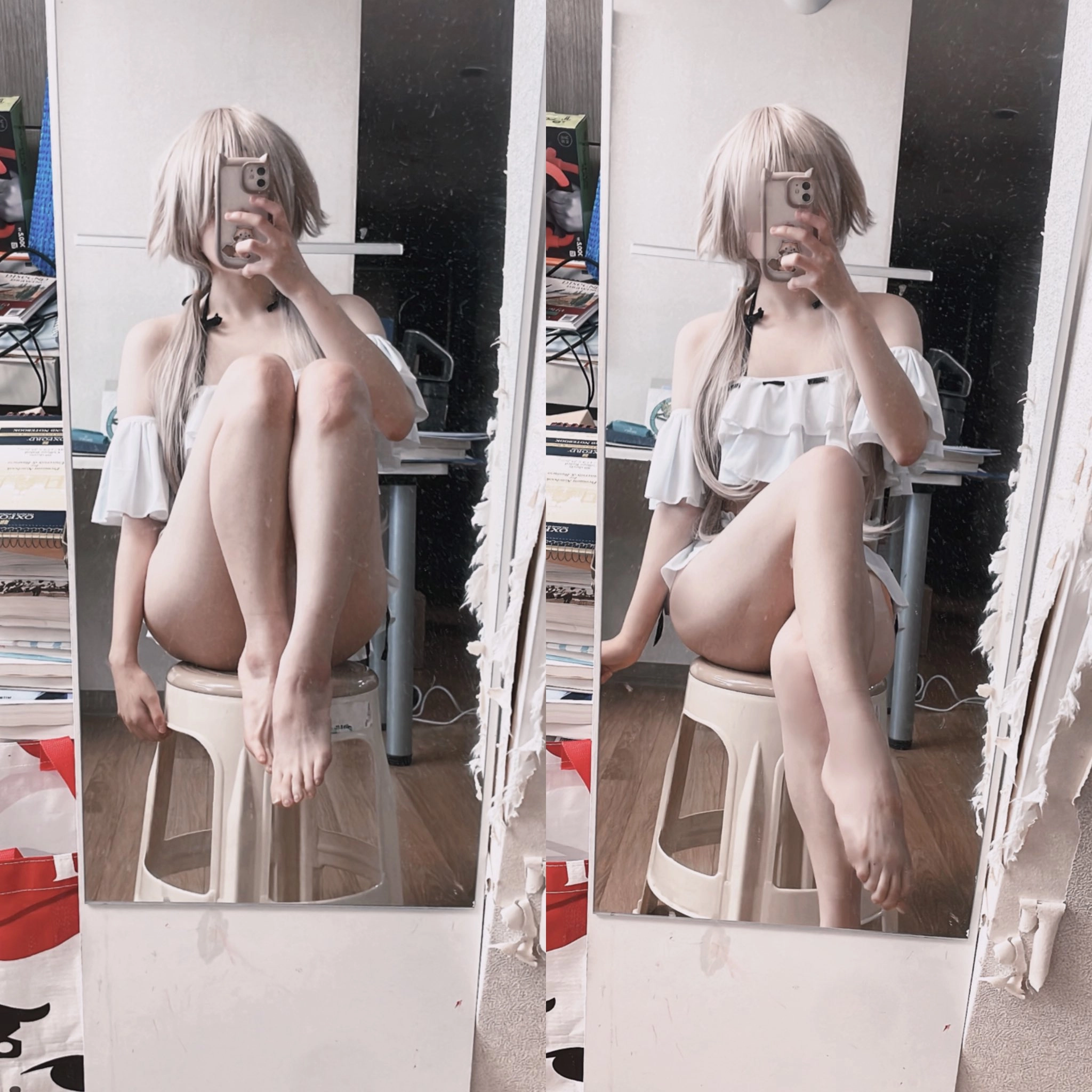 女人在镜子里拍自拍。