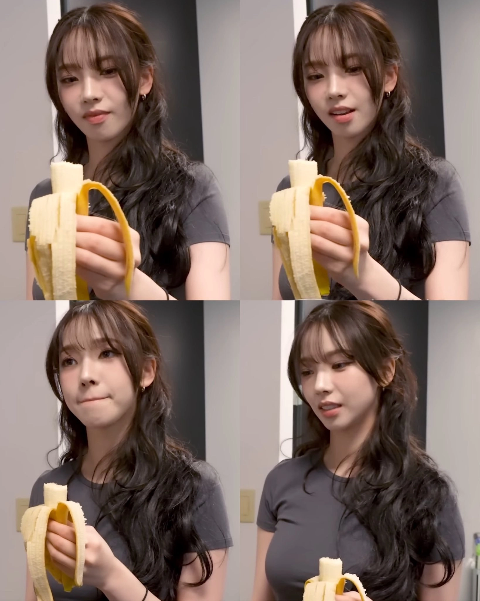 女人在她脸前拿着一个香蕉。