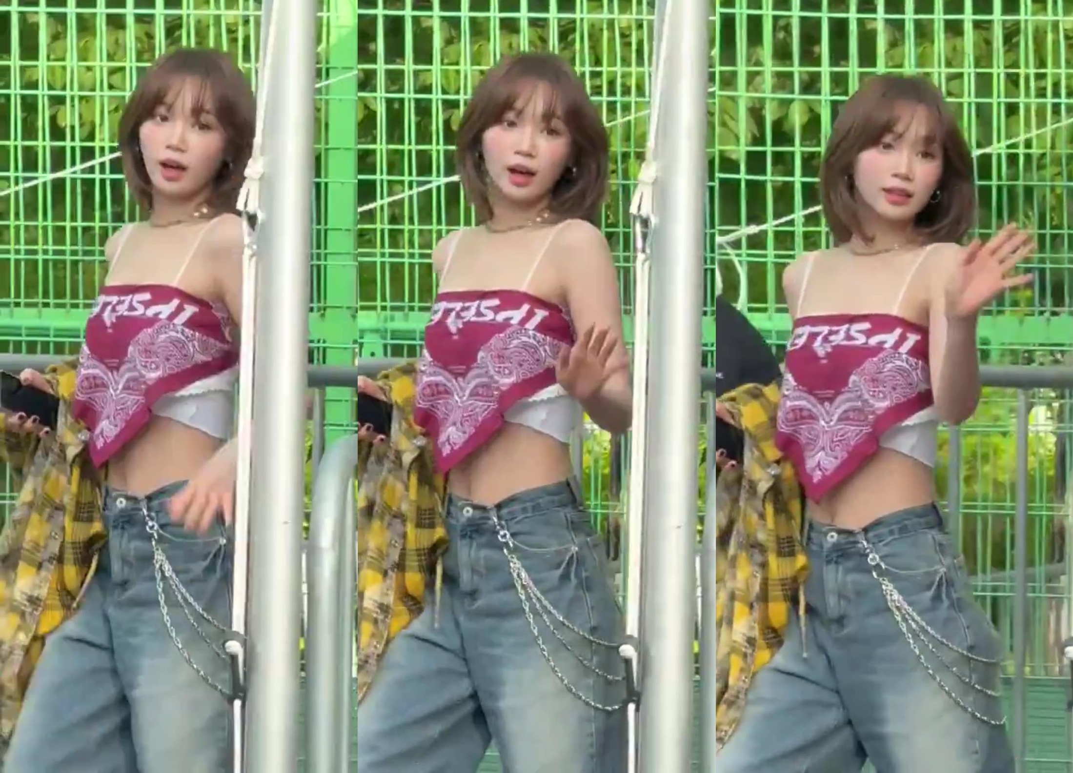 女人穿着红色班达纳和红色坦克顶。