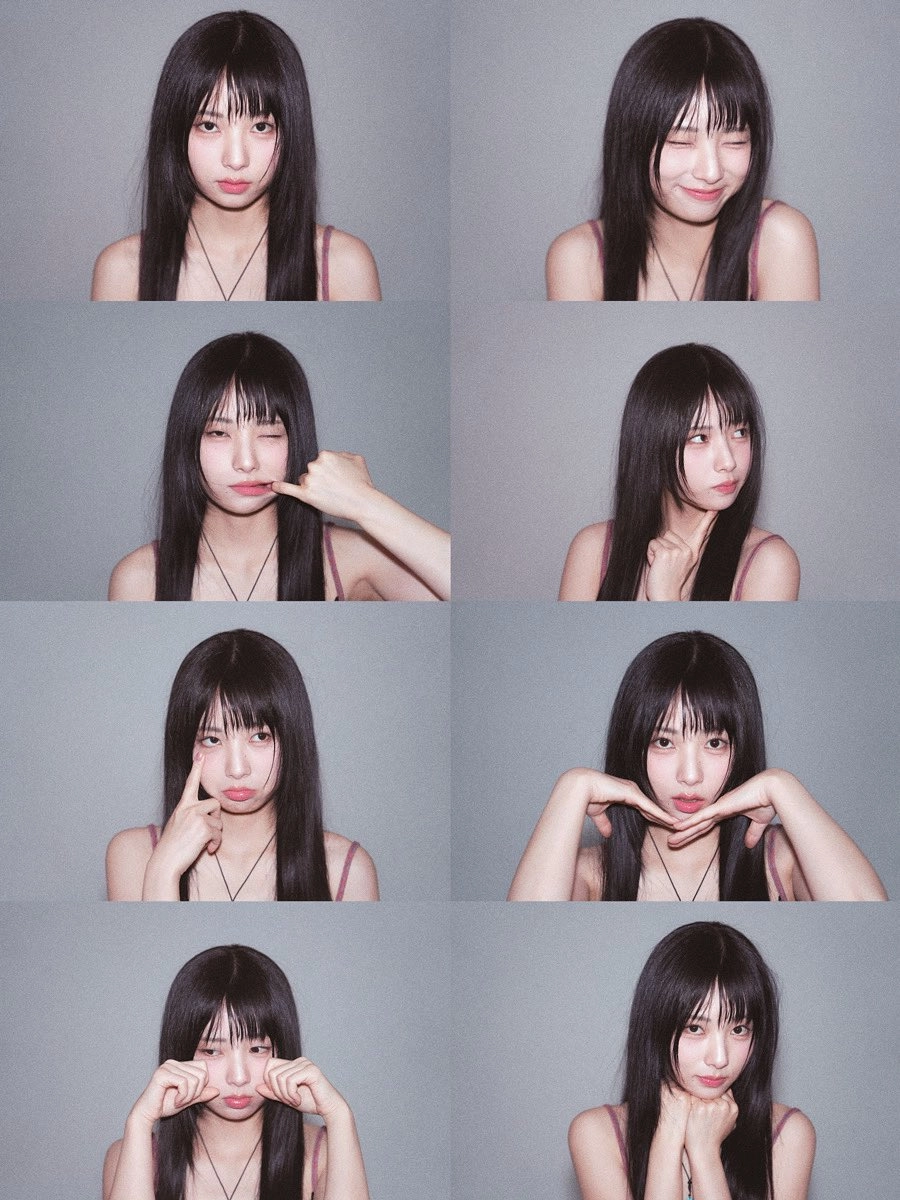 长黑头发的女人为一张照片而立场。