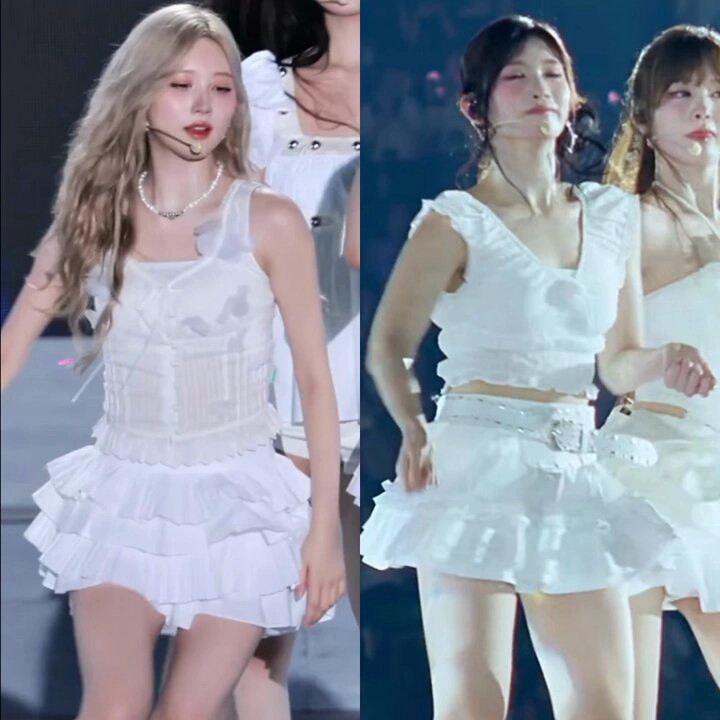 两个女孩穿着白色裙子,带着麦克风。