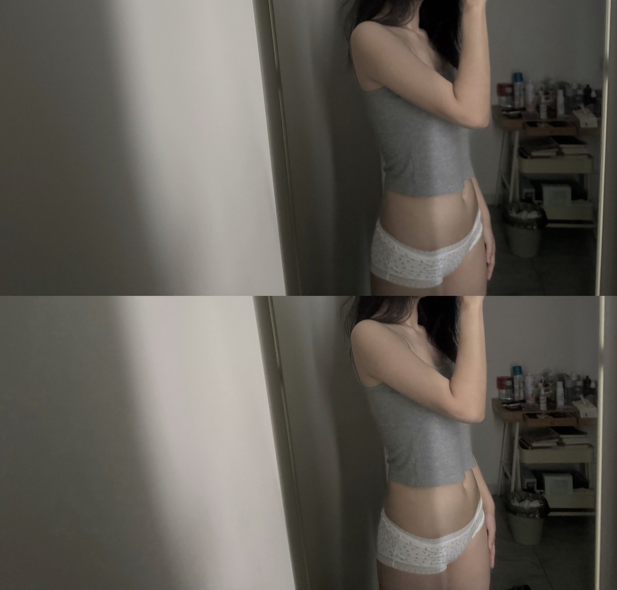 女人在镜子里拍自拍。