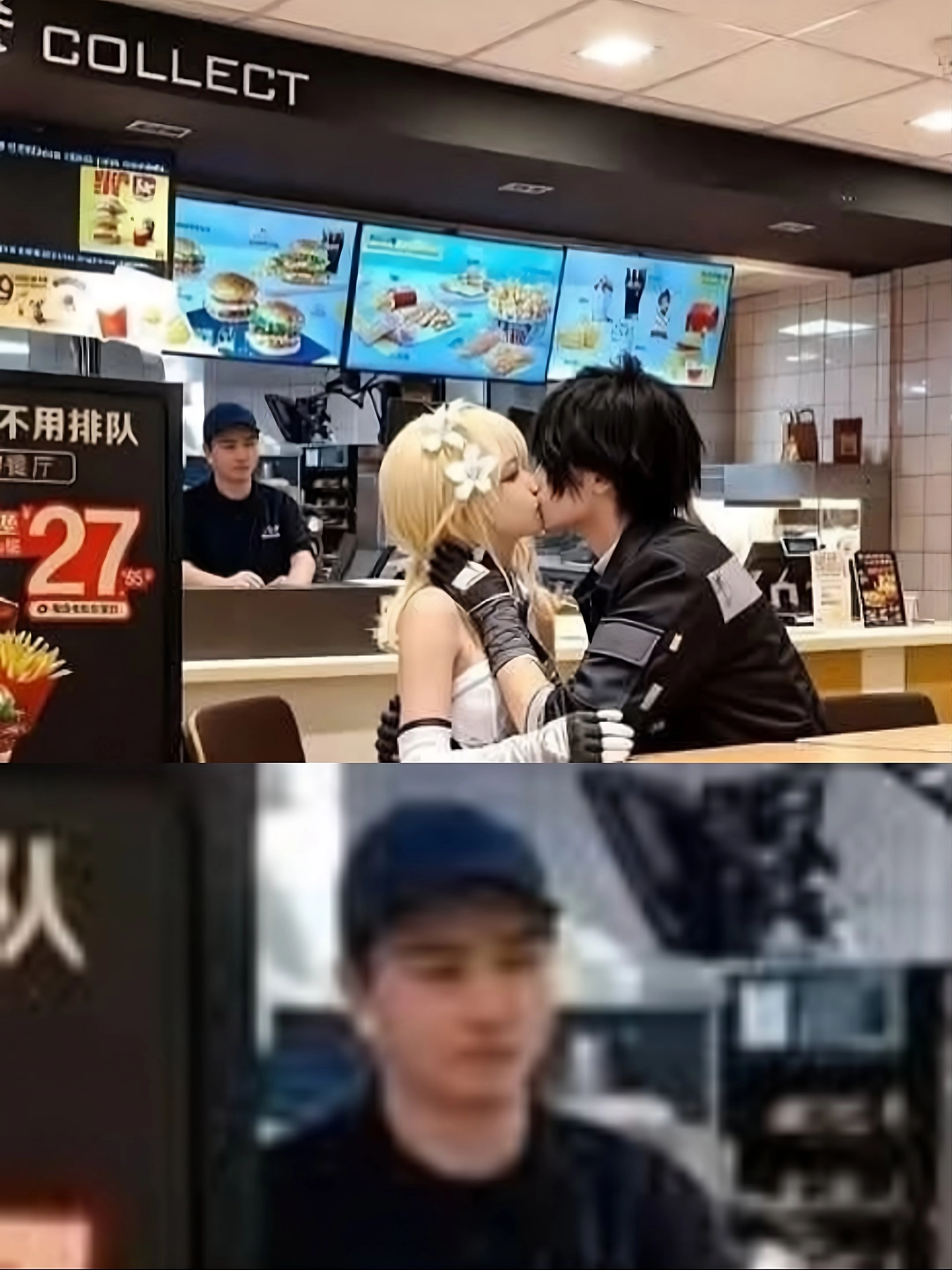 男人和一个女人在餐厅里接吻。