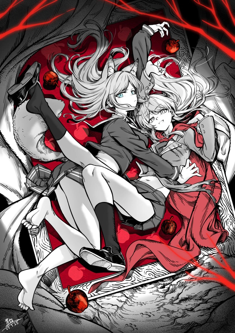 两个女孩躺在红色的毯子上,一个带着一个红色的衬衫。