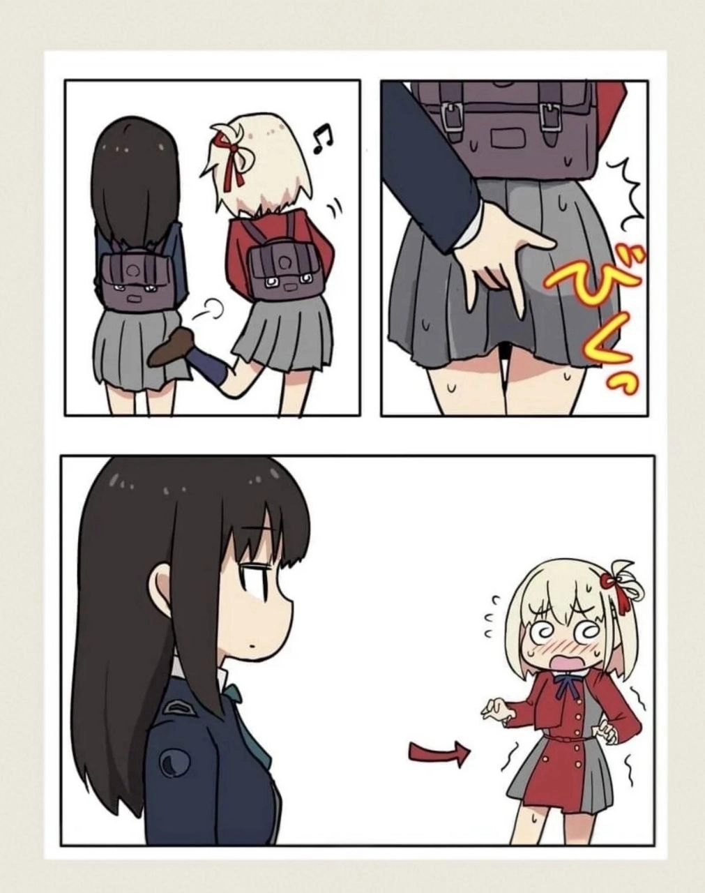 穿着红色衬衫的女孩指向另一个女孩。